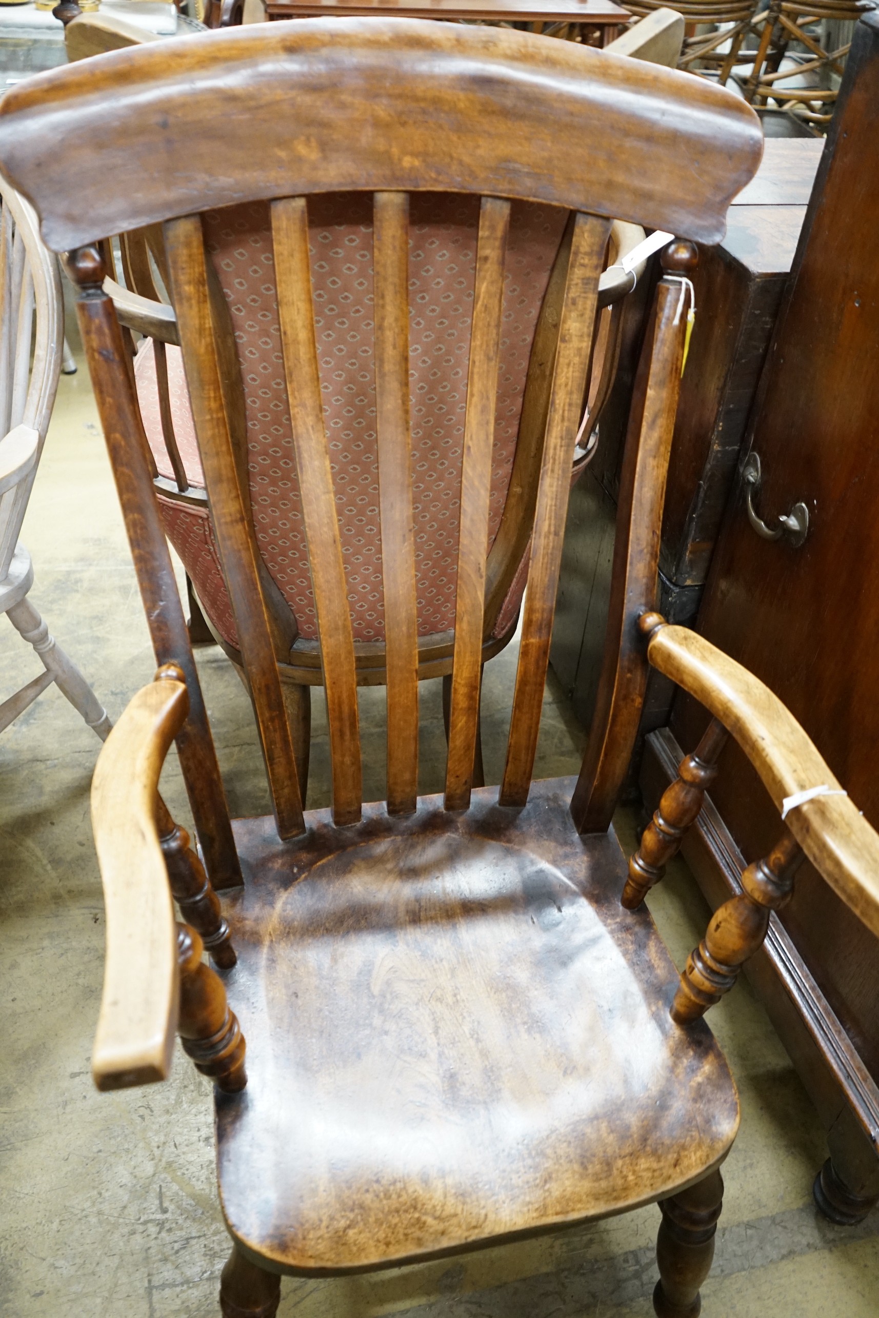 A Victorian elm and beech Windsor lathe back armchair, width 58cm, depth 46cm, height 115cm